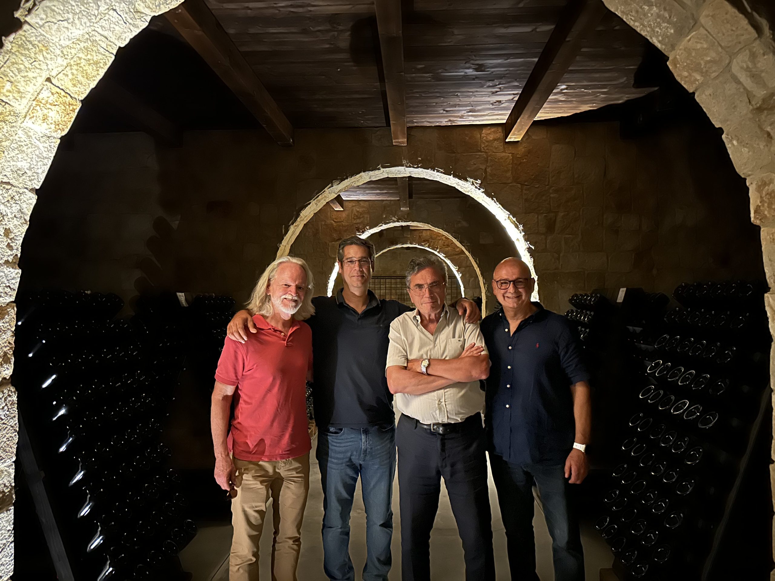 Bill-Frank-Ivan-Spinosa-and-Nicola-at-Tenute-Chiaromonte-Cellar-Puglia-scaled.jpeg